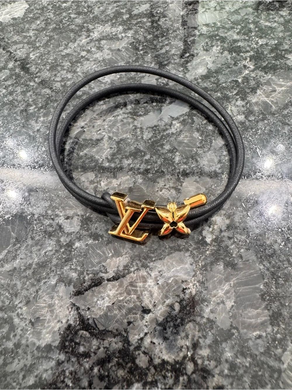 Louis Vuitton Black Cord Hair Tie with Gold LV and Flower Charms